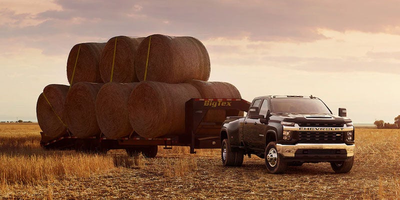 2021 Chevrolet Silverado 3500 HD towing hay trailer